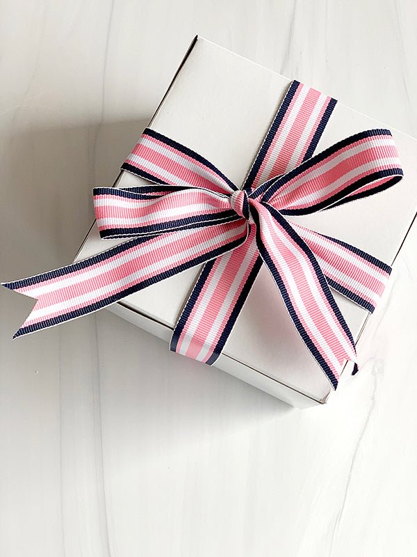 image of white give box tied with ribbon to signify a section for gift ideas
