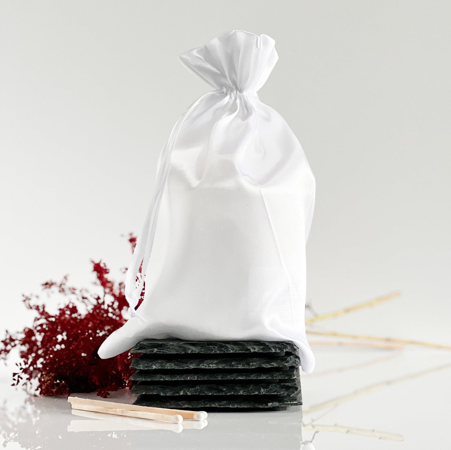 image of candle in a white bag to show our mystery bags