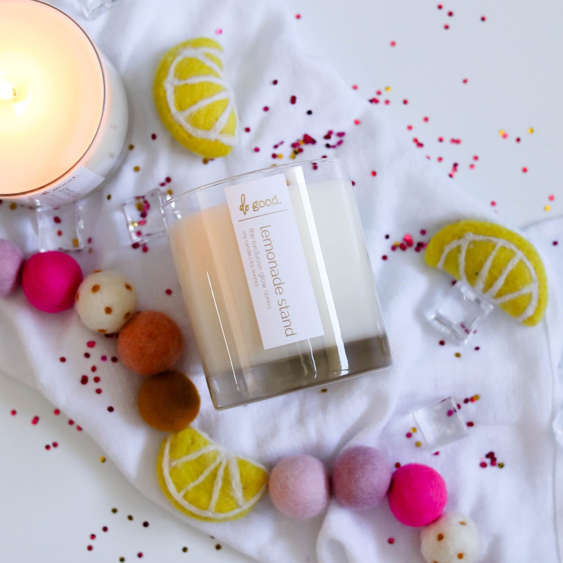 The Exclusive Glow Soy Candle - July: lemonade stand - do good adventures